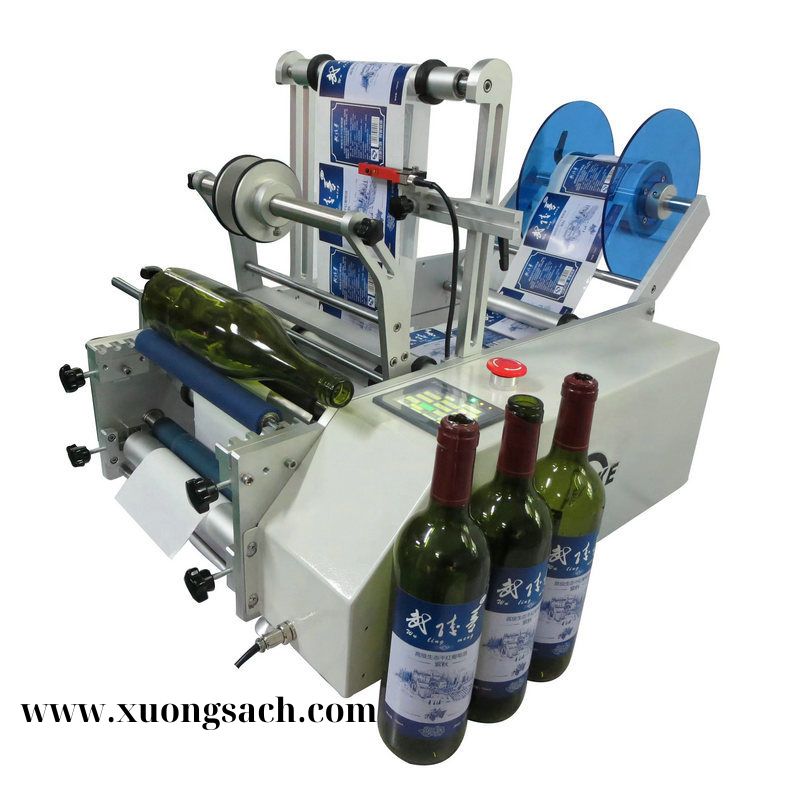 Máy dán nhãn decal chai tròn bán tự động